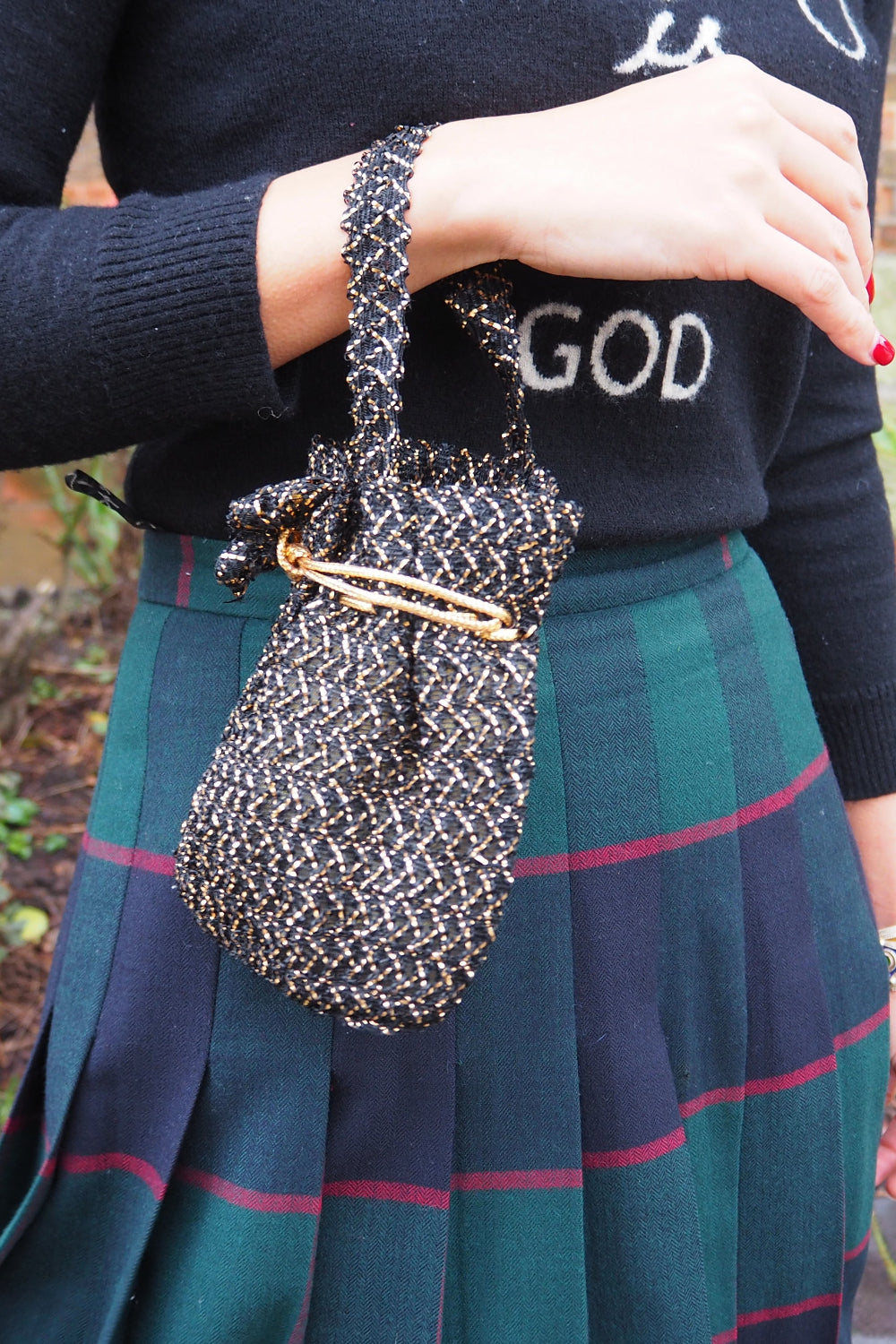 50s one-handle bag with flapper vibes